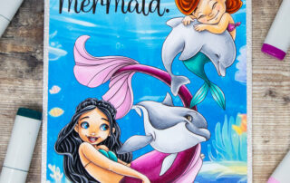 Copic marker coloured scene card inspiration & video featuring the Sweet November Stamps Dolphin Hugs and Mermazing Friends Cari & Neo digital stamps.