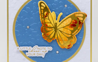 Handmade card inspiration featuring Spellbinders January 2025 Club of the Month BetterPress plates, the Glimmer Hot-Foil system, and embossing folder.