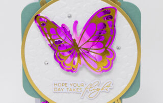 Handmade card inspiration featuring Spellbinders January 2025 Club of the Month BetterPress plates, the Glimmer Hot-Foil system, and embossing folder.