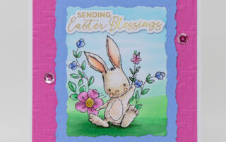 Handmade card inspiration & Copic colouring video featuring Spellbinders February 2025 Club of the Month Spring Smiles clear stamp & die kit.