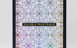 Handmade card inspiration featuring Spellbinders March 2025 Club of the Month BetterPress Plate - Quilted Memories, hot foiled using rainbow foil.