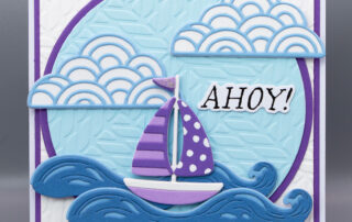 Handmade card inspiration featuring Spellbinders June 2025 Club of the Month "Sailor's Light" Large Die Set, "Set Sail" bonus die set, "Mariner's Weave" embossing folder & "Anchors Away" clear stamp and die set.