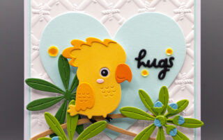 Handmade card inspiration featuring Spellbinders Cheerful Chirps collection products: Free Hugs Oscar die set, Flying High die set, Bamboo Screen 3D Embossing Folder.