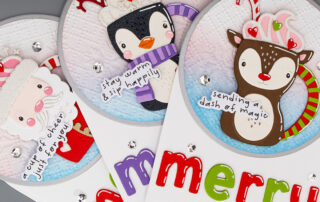 Handmade Christmas card inspiration featuring Spellbinders July Club of the Month Cocoa Greetings die set, Frosted Stitch embossing folder, Stay Snuggly clear stamp & die set.