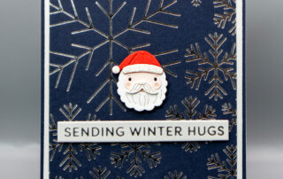 Handmade Christmas card inspiration featuring Spellbinders July Club of the Month Mugs & Mittens die set, and the Arctic Glimmer Hot Foil kit.