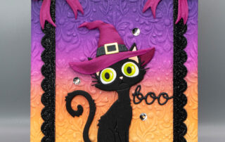 Handmade die cut Halloween card inspiration featuring the Simon Hurley Spooktacular Bewitched etched die set from Spellbinders Paper Arts.