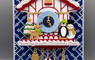 Handmade card inspiration featuring Spellbinders Paper Arts Cuckoo Cottage collection Chiming Christmas add on die set & press plate set.