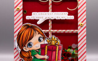 Christmas shaker card & Copic marker video featuring Sweet November Stamps Joy clear stamp set, and the Mama Elephant All Tied Up die set.