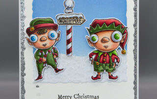 Christmas card featuring AALL & Create Janet Klein The North Pole stamp set along with their Polaroid Pop die set!