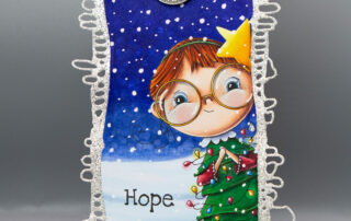 Christmas tag inspiration featuring Stamping Bella Lunettes Christmas Girl rubber stamp coloured using Copic markers.